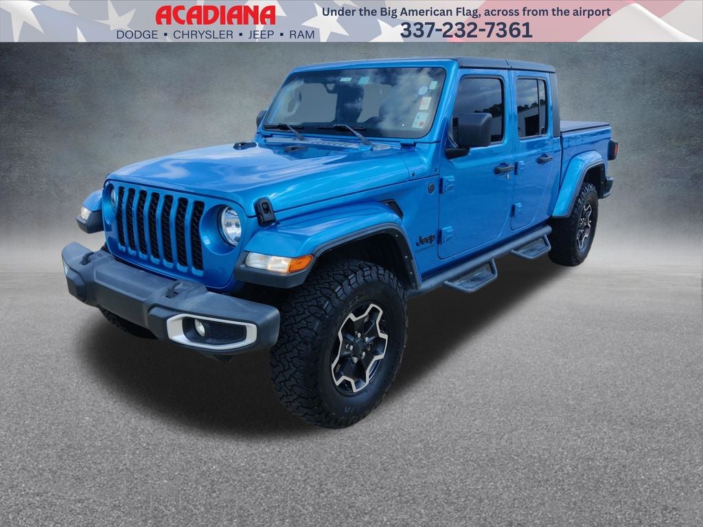 2022 Jeep Gladiator Sport in Hydro Blue Pearlcoat — front three-quarter view