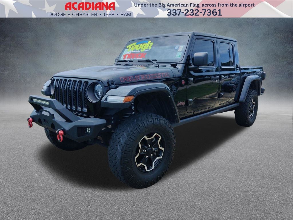 2023 Jeep Gladiator Rubicon in Black Clearcoat — front three-quarter view