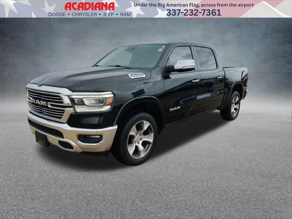 2021 RAM 1500 Laramie in Diamond Black Crystal Pearlcoat — front three-quarter view